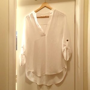Perfect roll-tabbed white sleeved tunic